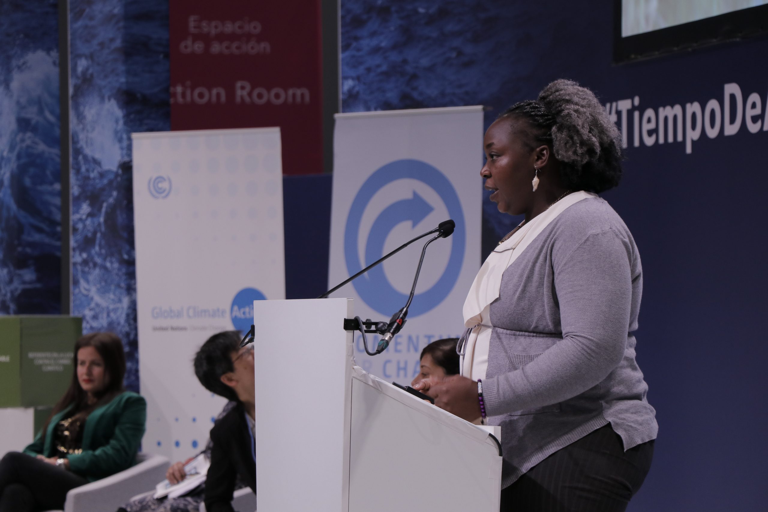 Esnath Divasoni speaking at COP25 in Madrid.