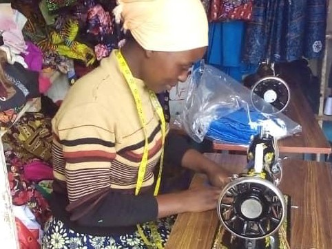 Aloisia sewing face masks for medical staff in Tanzania