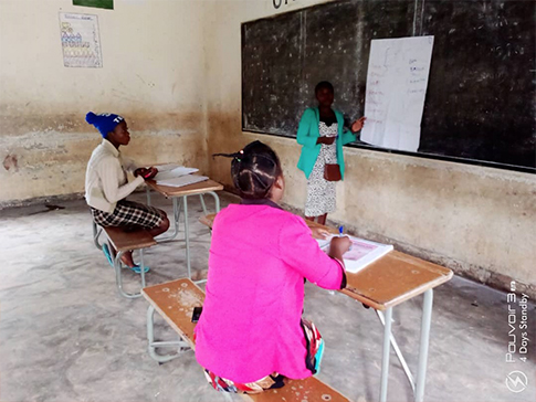 Transition Guide Bridget Mafinga, delivers a learning  session in Zambia.  