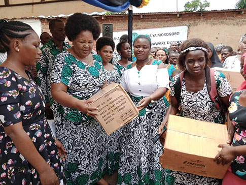 CAMFED Association members with District Commissioner Regina Chonjo CAMFED Association members with District Commissioner Regina Chonjo