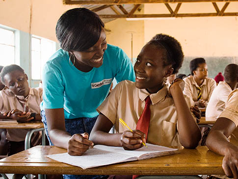 CAMFED Learner Guide Alice delivering a mentoring session. CAMFED Learner Guide Alice delivering a mentoring session.
