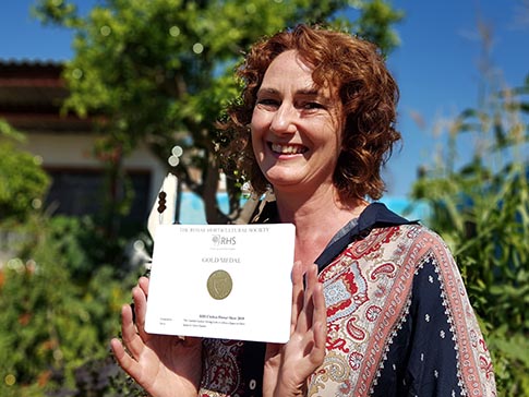Garden designer Jilayne Rickards with the Gold medal award.