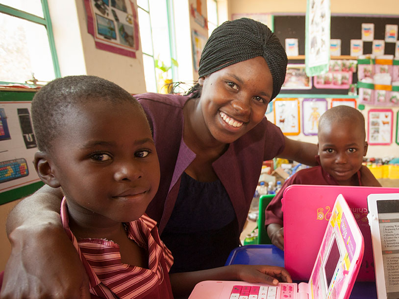 CAMA member & teacher Sazini with young learners