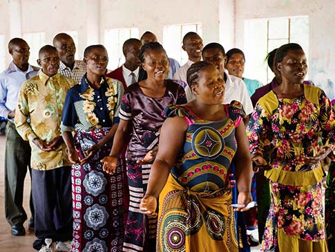 Rhoda and other parents lead a school welcome Rhoda and other parents lead a school welcome