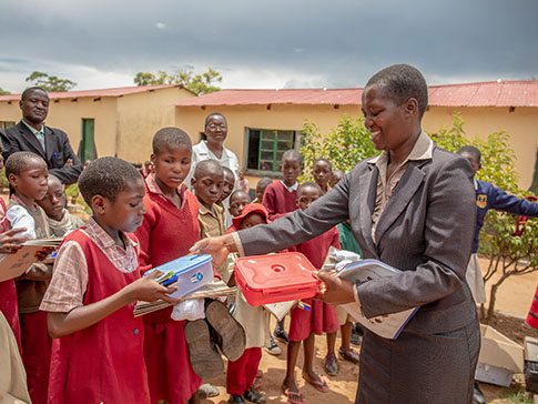 Lucia distributing essentials to vulnerable students Lucia distributing essentials to vulnerable students