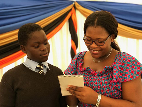 Linda with a CAMFED Secondary Scholar