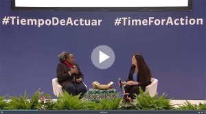 Esnath and Catherine on stage at COP25