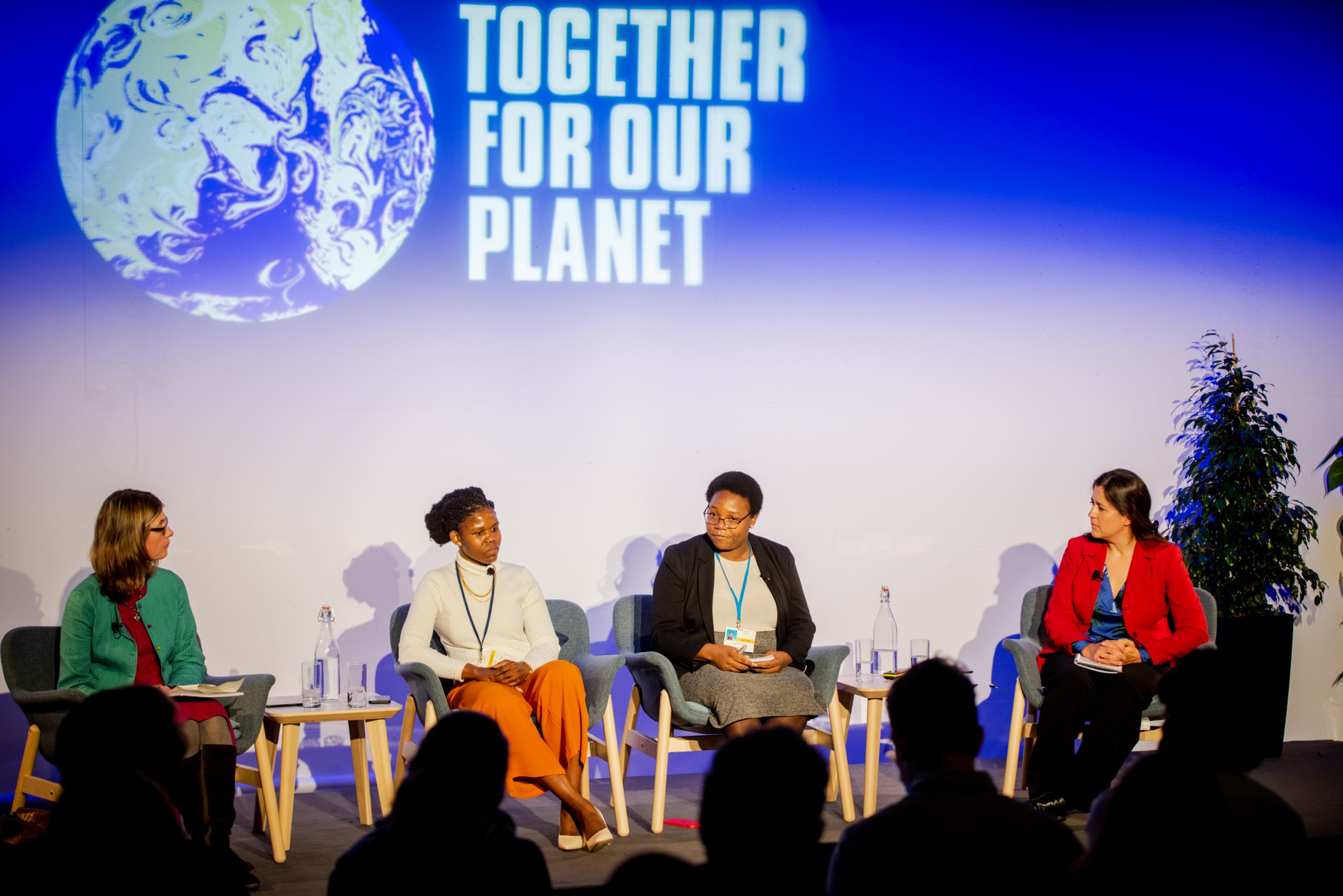 Emma Spicer chairs the Green Zone event with Forget Shareka, Fiona Mavhinga, and Catherine Boyce at COP26
