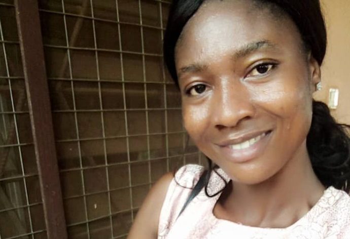 Juliana-Atanga-CAMFED-Association-Ghana-nurse-with-baby-July-2022