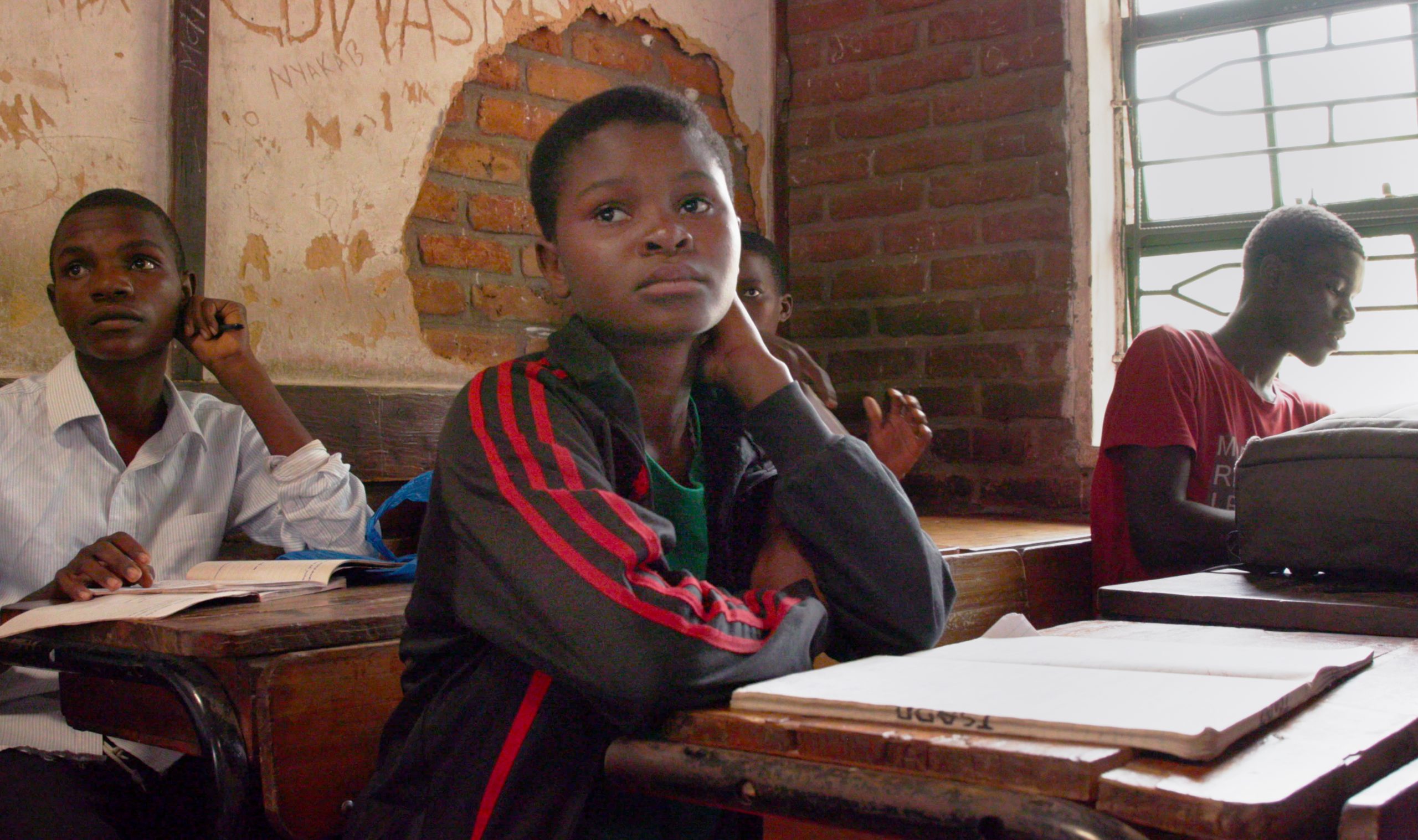 Student-In-Class-Listening-Chikwawa-MW-15-Aug-2019_Catherine-Cardwell-MVI_7177