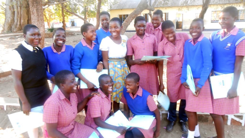 CAMFED Association member Natasha with secondary students in Buhera district, Zimbabwe